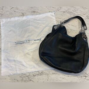 Michael Kors black leather handbag and dust bag.